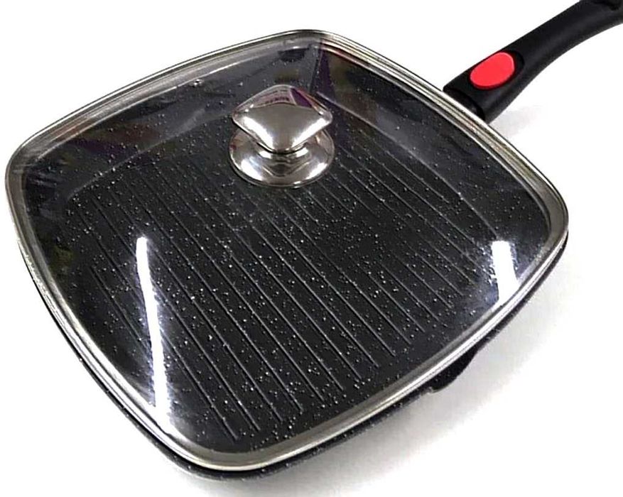 Запечатанная сковорода гриль с крышкой .