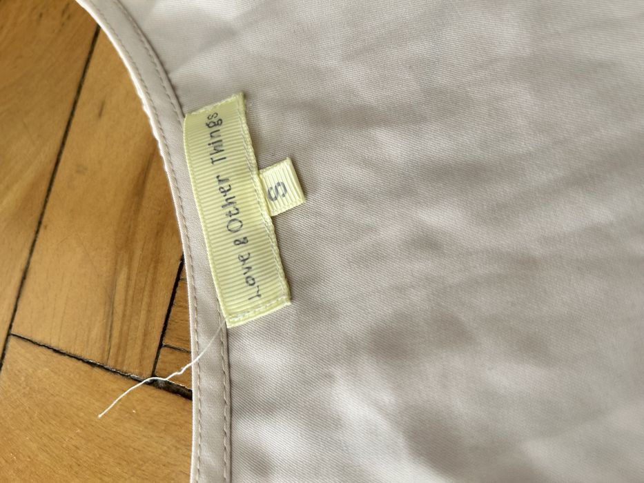 Damski kremowy kombinezon