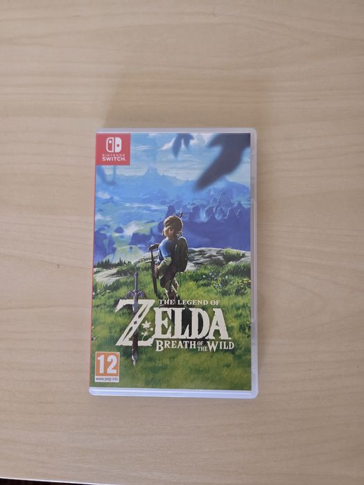 Nintendo Switch OLED + Jogo The Legend of Zelda Breath of the Wild