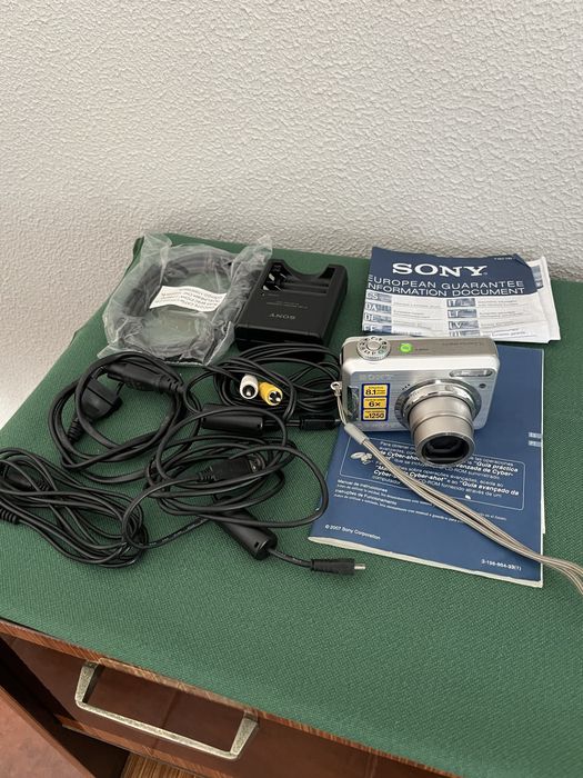 Máquina fotográfica com tripé e respetivo materias tudo impecável