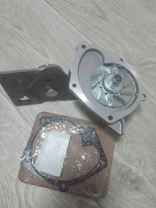 Помпа, натяжний ролик на планці Renault, Opel, Traffic 1.9 dci