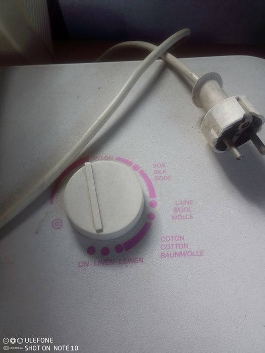 Maquina manual de passar a ferro SINGER