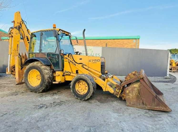 Екскаватор - навантажувач NEW HOLLAND (JCB 3CX)