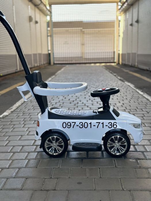 Толокар с ручкой поворотной БМВ музыка и свет, скидка!!!