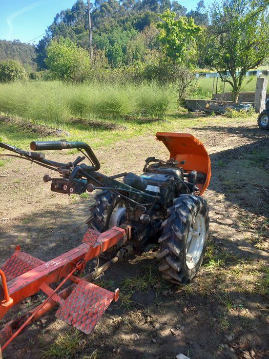 Motocultivador  com alfaias e reboque