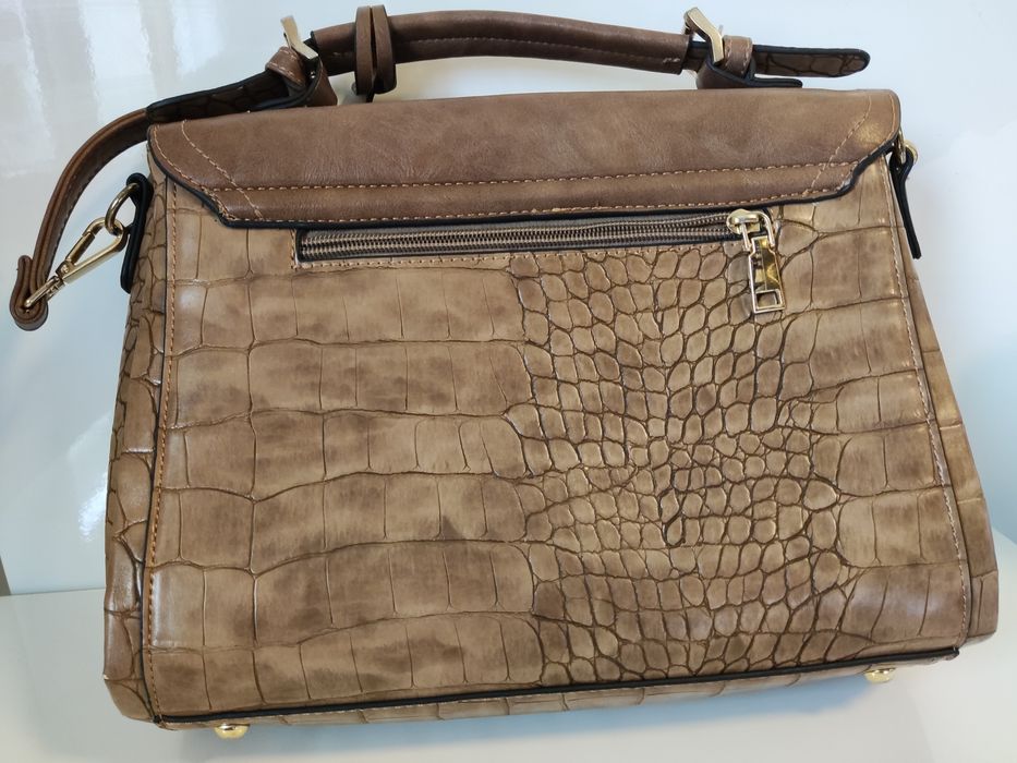 Mala castanha em pele