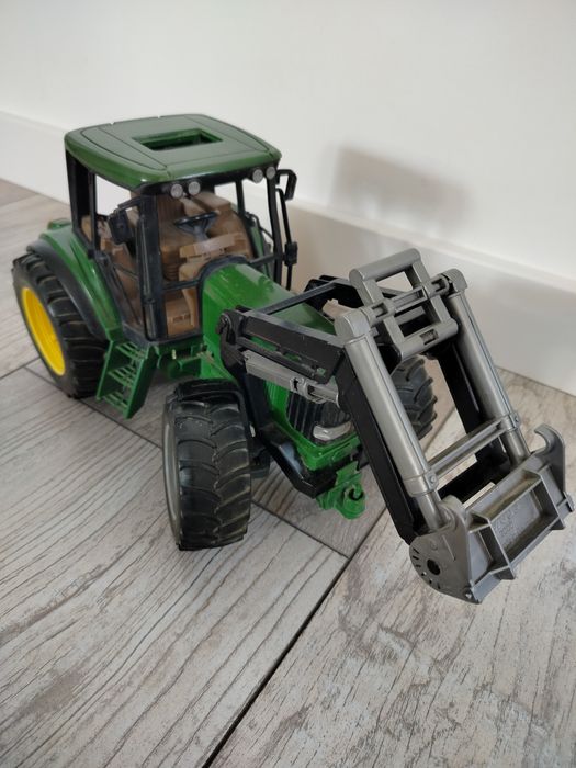 Traktor John Deere z turem