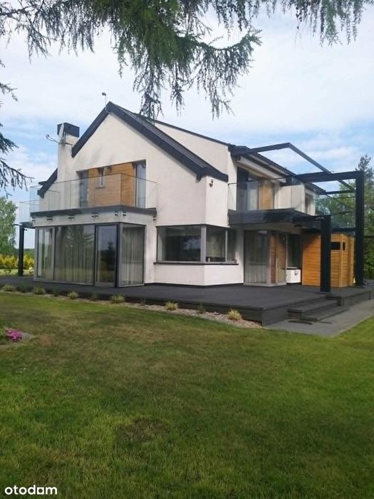 Dom z sauną, jacuzzi. Duży ogród, widok na Jeziorak - pierwsza linia.