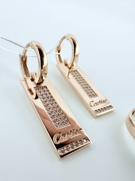 Золота каблучка / сережки