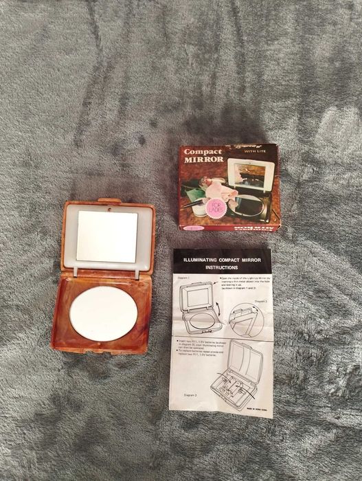 Espelho compacto com luz