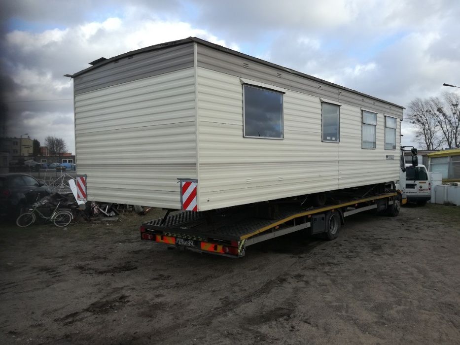 pomoc drogowa transport laweta koparka  bus widlak przyczepa domek