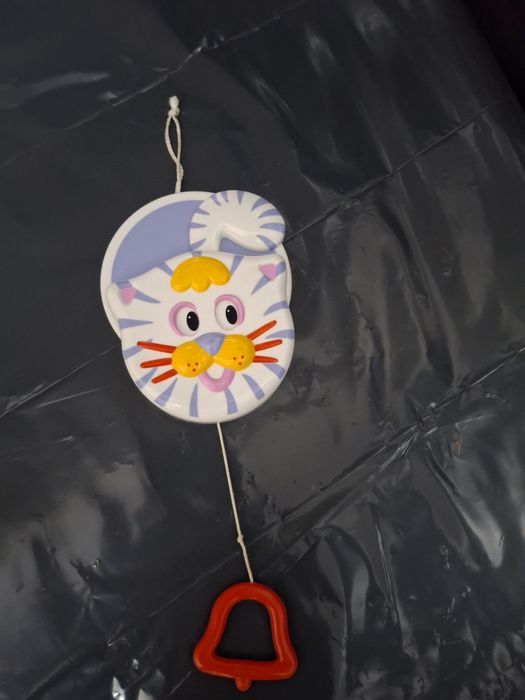Gato musical de embalar para bebé