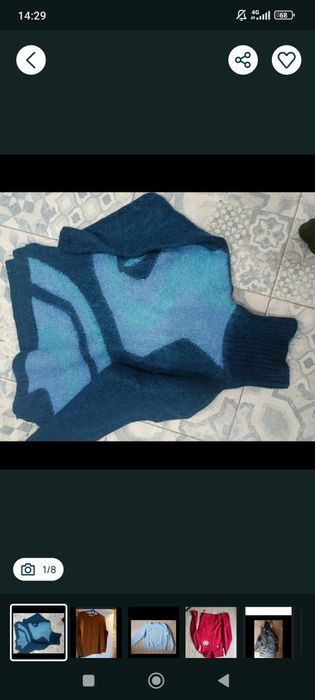 Елегантний кашемірний светр глибокого темно-синього відтінку.

Особлив