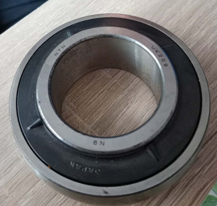 Regulator przepływu Bizon Z056 łożyska sieczkarnia  UK209 2207 UD207S