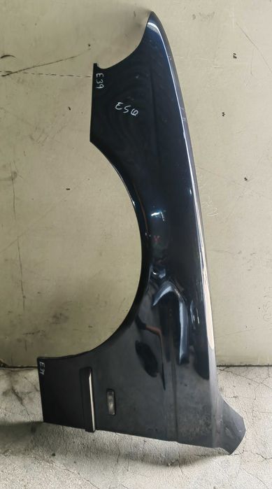 Guarda lamas esquerdo Bmw E39