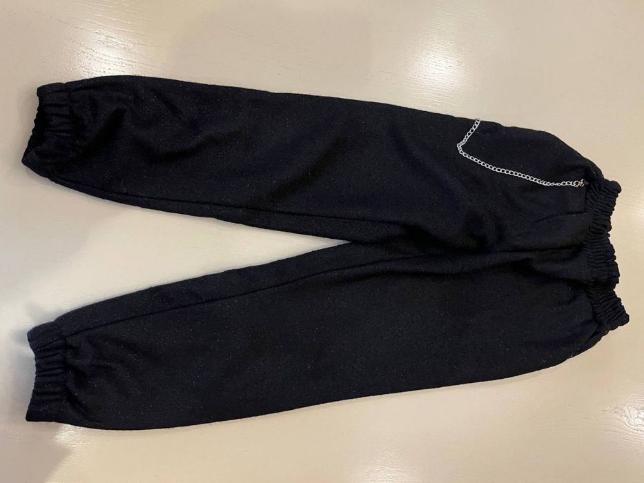 блискучі чорні штани для дівчинки