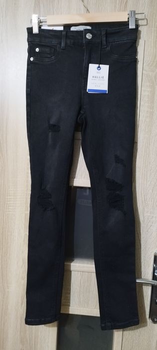 Spodnie dżinsowe rozciągliwe, przecierane