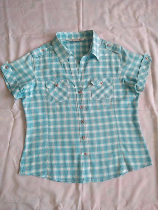 Блузки й сорочки жіночі