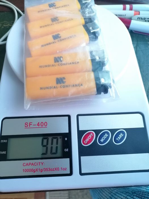 Conjunto de 5 isqueiros com publicidade à Companhia de Seguros Mundial