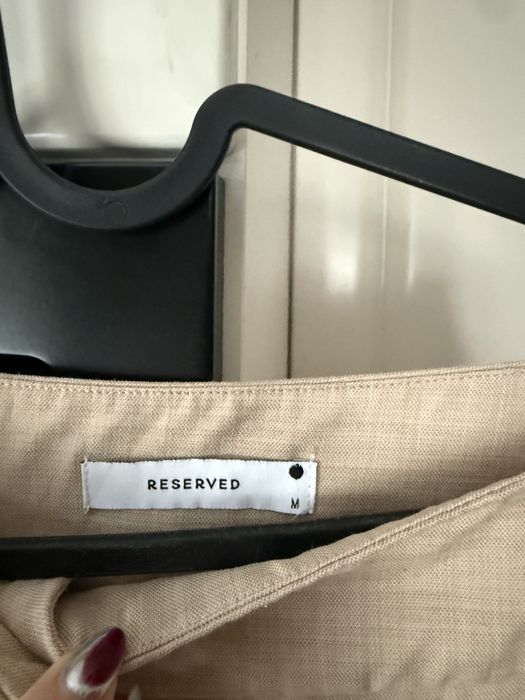 Beżowe spodnie proste szerokie nogawki reserved m