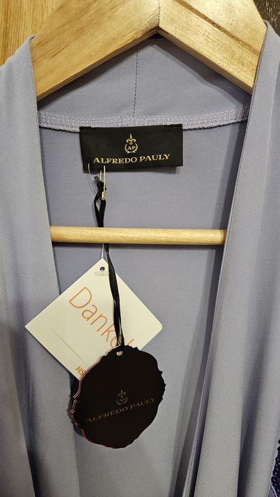 Nowa narzutka z cekinami 48-50 elastyczna