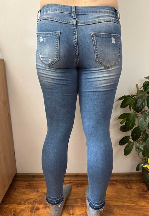 Spodnie jeansowe elastyczne rozdarciami jeansy stretch My Hailys L 40