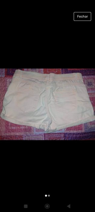 Calções de adulto e vestido de criança