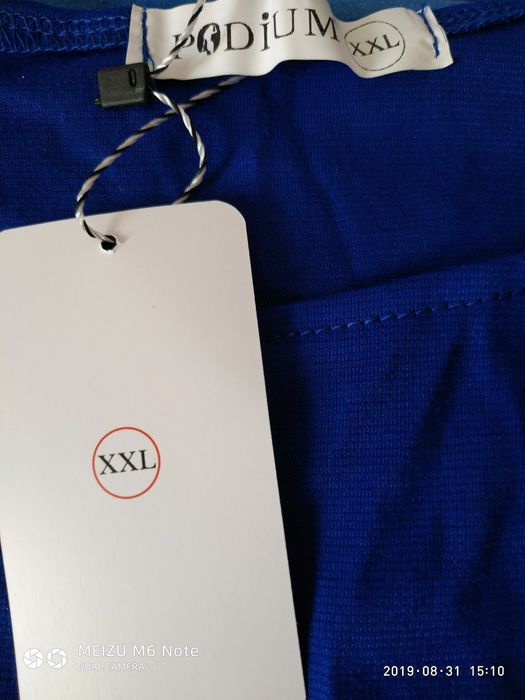 Продам Крассивый костюм цвет электрик юбка+кофточка