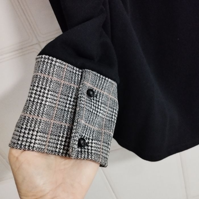 Camisola de marca SCUSI