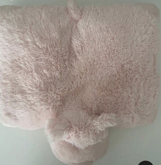 Porquinho que se pode transformar em almofada
