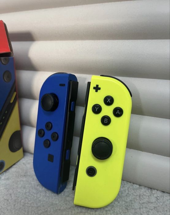 Joy con do Nintendo switch żółto niebieski