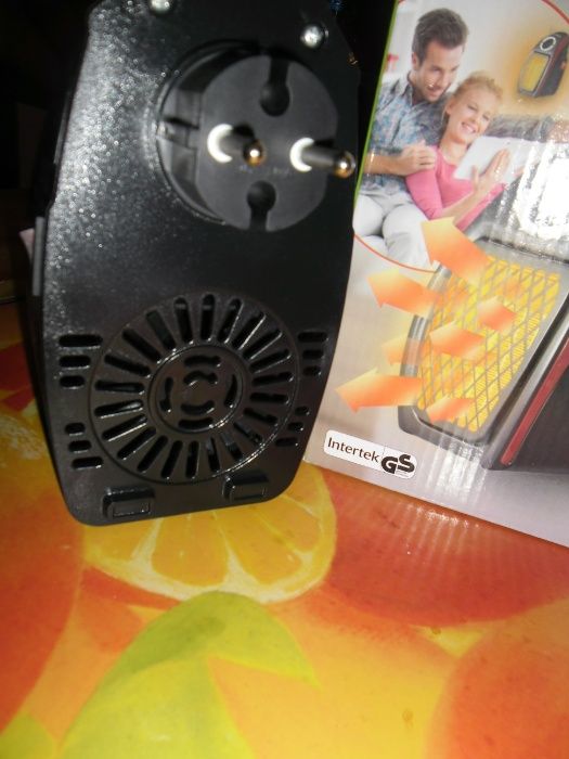 mały grzejnik do kontaktu nowy