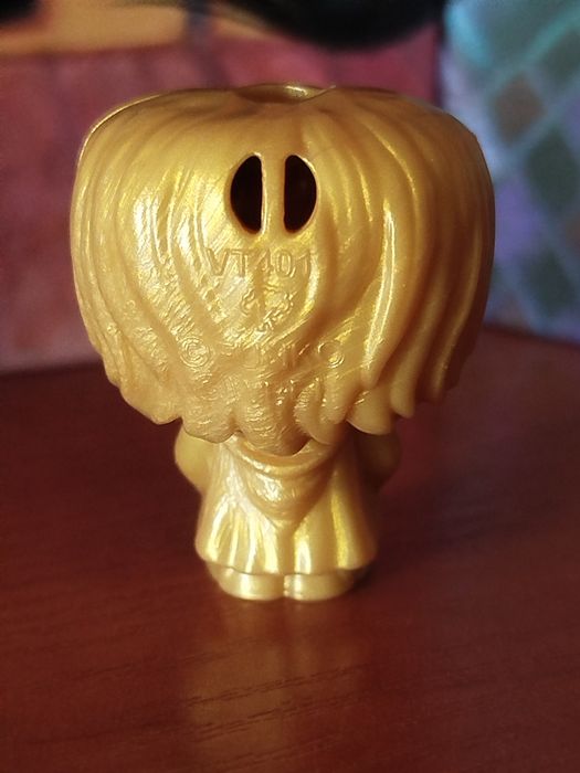 Золота фігурка Гаррі Поттер