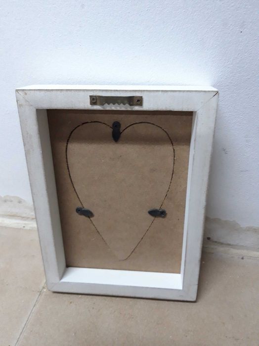 Moldura para fotografia em desenho de coração