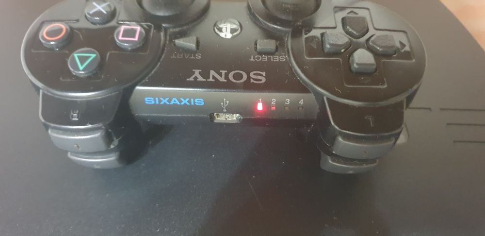 PS3 Slim + 10 jogos