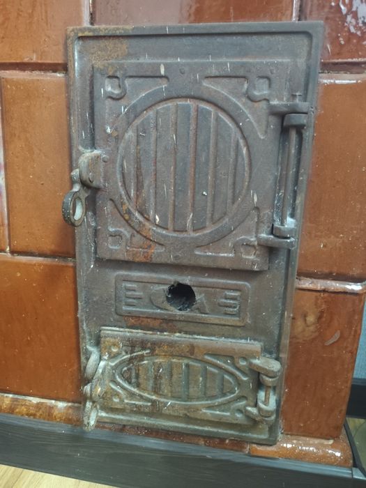 Чавунні дверцята до печі, п'єца