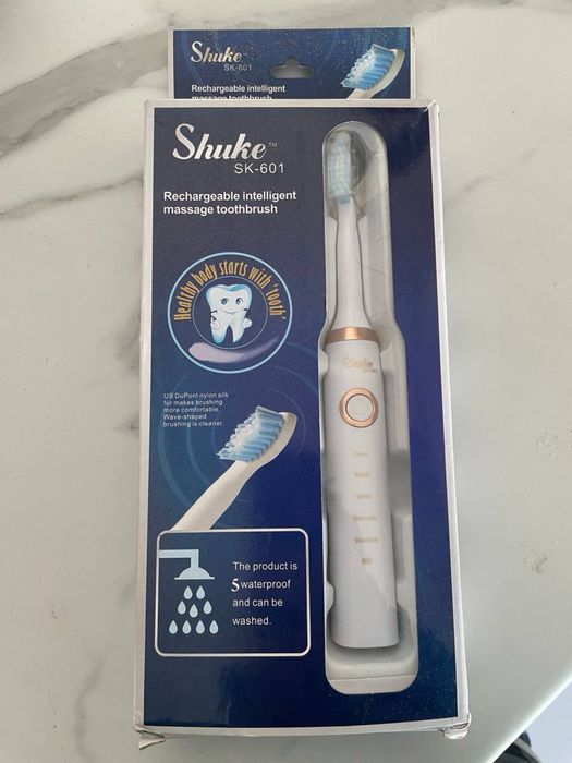 Електрична зубна щітка