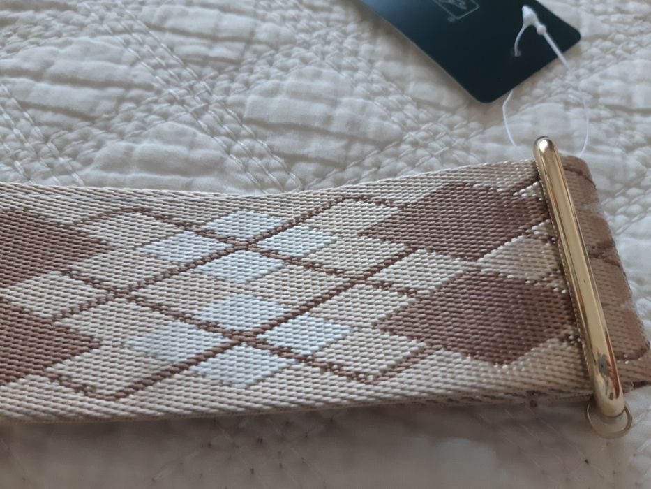 Alça para malas em tons creme