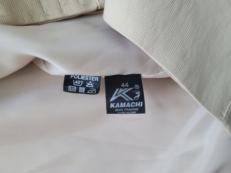 Beżowy płaszcz r. 42