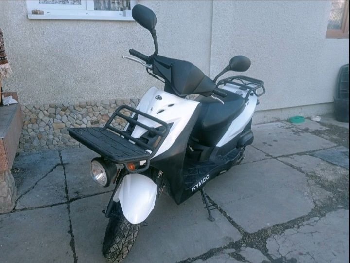 Продам скутер кумко kymсo