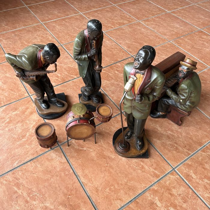 Estátuas de uma banda “Vintage Afro American Jazz Band”