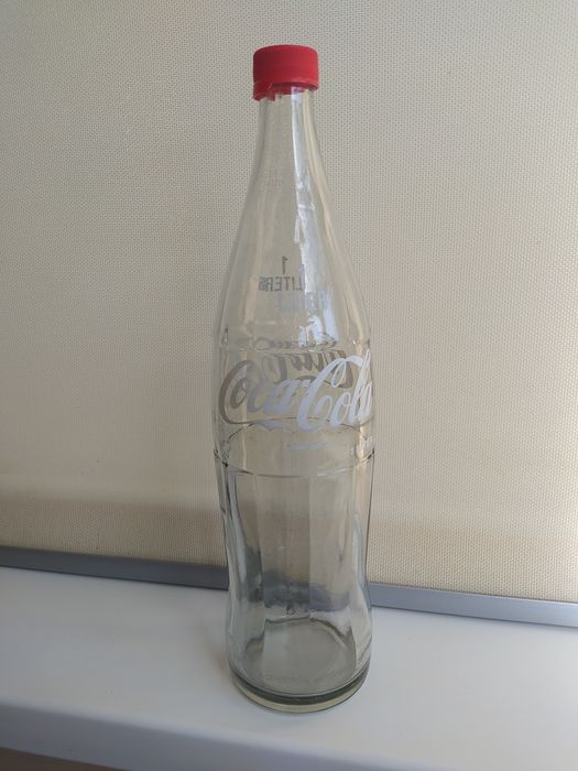 Пляшка Coca-Cola 1 liter.