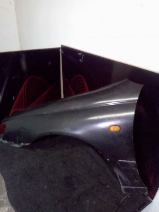 Guarda Lamas Esq Toyota Carina E (_T19_)
