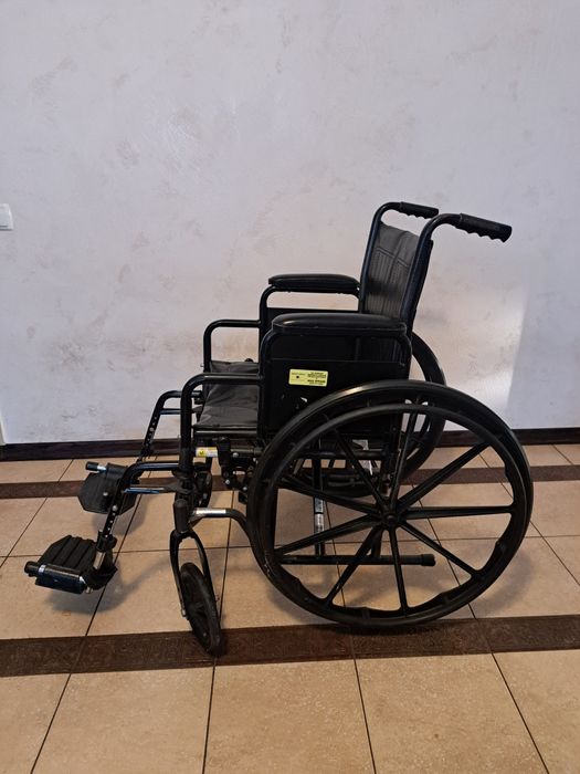 Коляска для людей з особливими потребами