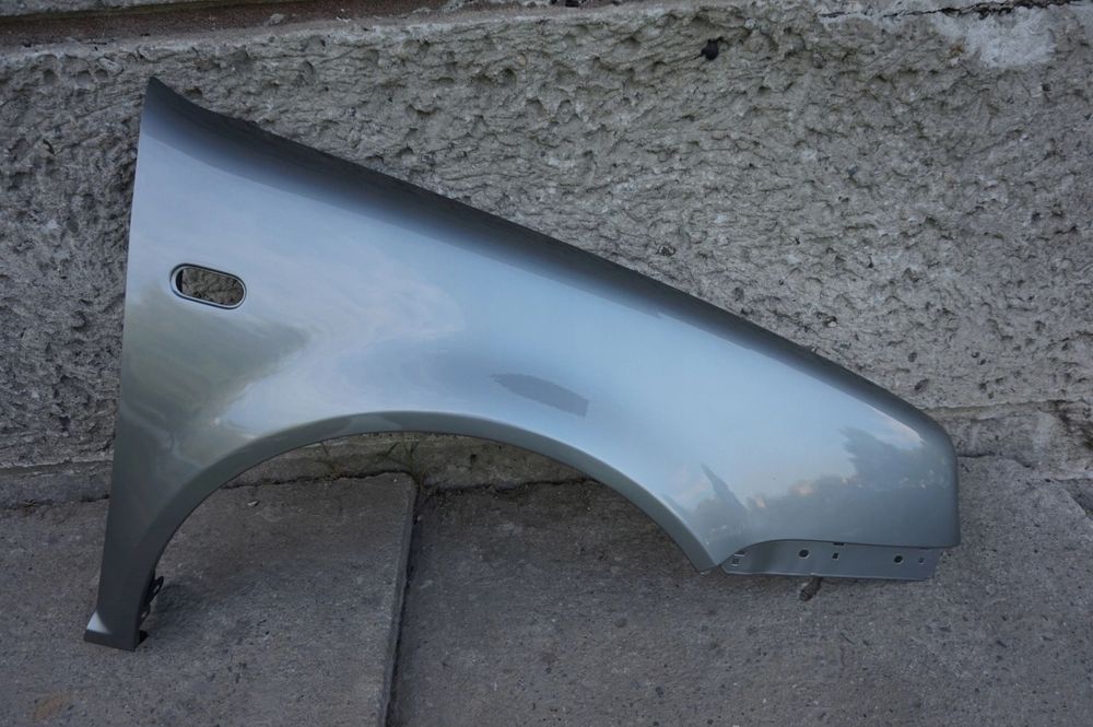 BŁOTNIK PRZEDNI PRAWY VW GOLF IV LD7V