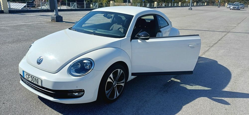 VW Beetle coupe TSI troca retoma