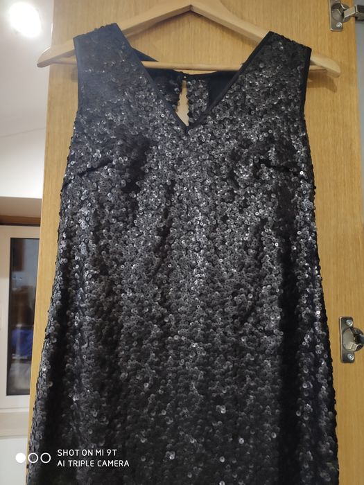 Vestido preto de lantejoulas