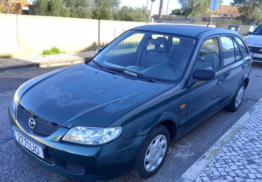 mazda 323 f bom e barato