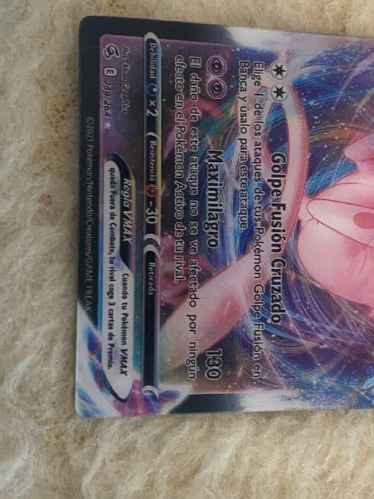 Mew Vmax (Fusion Strike) with two illusion versions.64563994908417122