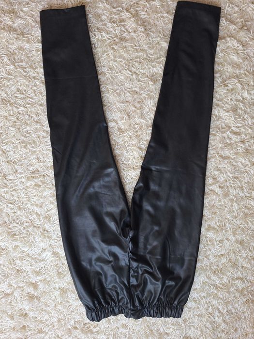 Штани з еко-шкіри для дівчинки на 11 років.